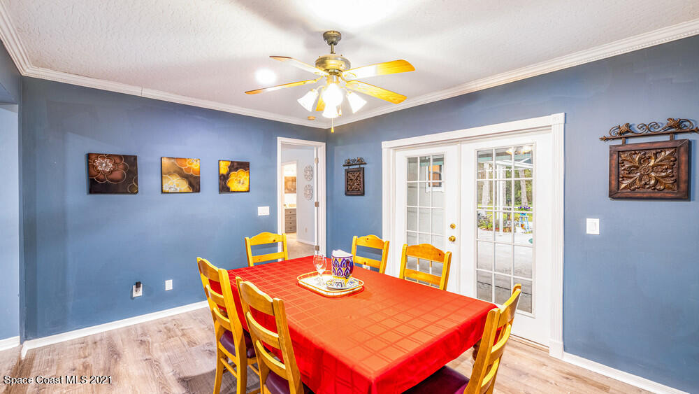 4211 Mustang Road Melbourne, FL 32934 - Photo 26 of 61 030_dining_room_view_ii