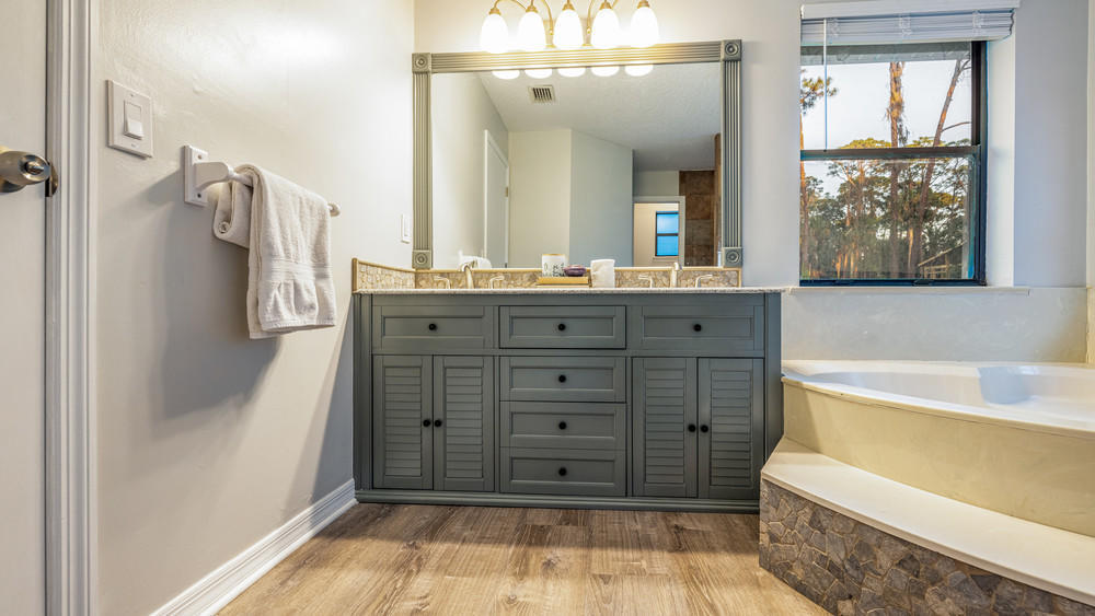 4211 Mustang Road Melbourne, FL 32934 - Photo 30 of 61 053_master_bathroom_view_ii