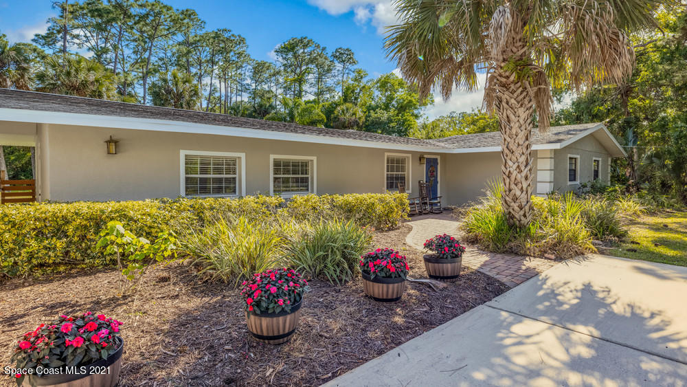 4211 Mustang Road Melbourne, FL 32934 - Photo 4 of 61 003_front_of_home