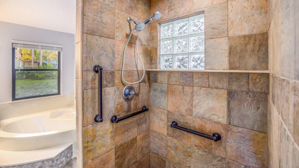 4211 Mustang Road Melbourne, FL 32934 - Photo 32 of 61 055_master_bathroom_view_iv