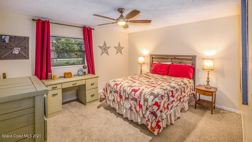 4211 Mustang Road Melbourne, FL 32934 - Photo 36 of 61 021_bedroom_i_view_i