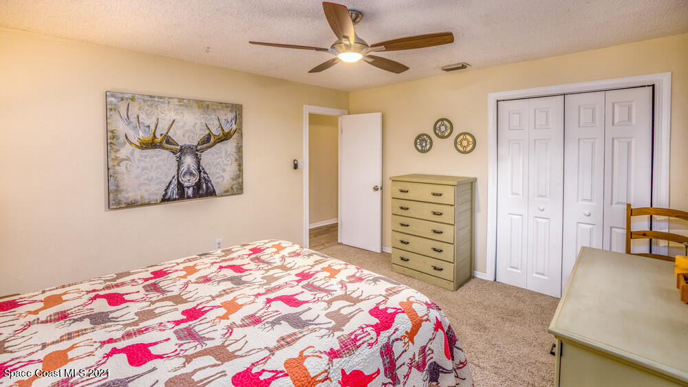4211 Mustang Road Melbourne, FL 32934 - Photo 37 of 61 022_bedroom_i_view_ii