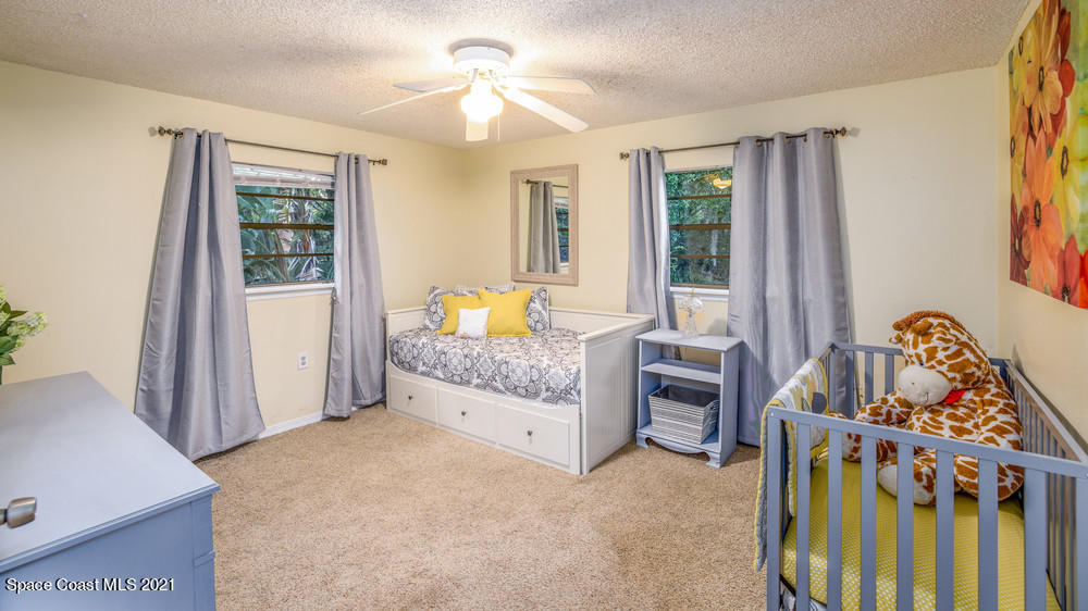 4211 Mustang Road Melbourne, FL 32934 - Photo 38 of 61 023_bedroom_ii_view_i