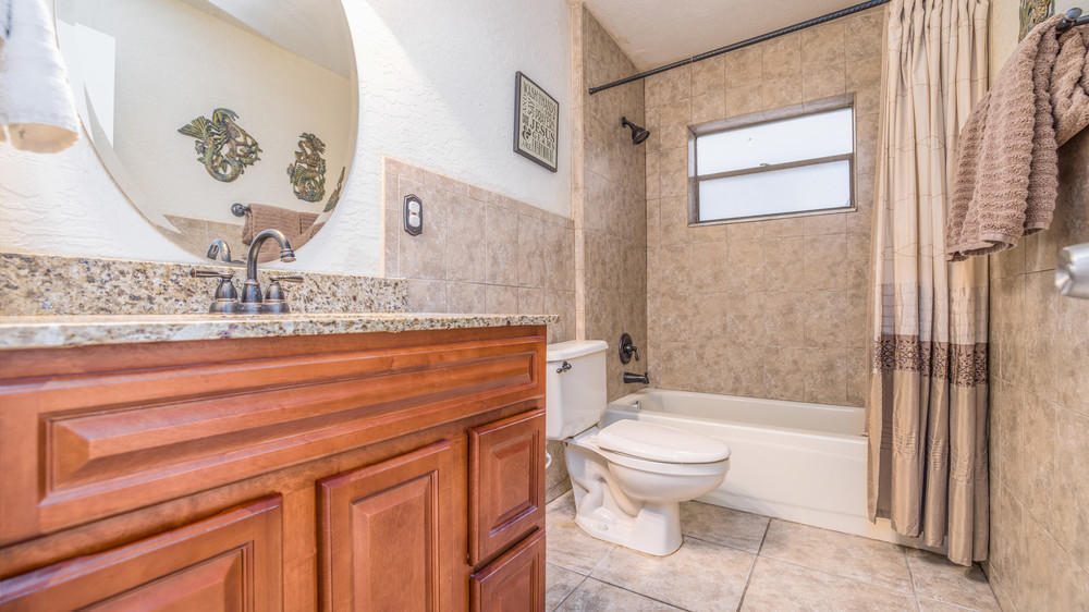 4211 Mustang Road Melbourne, FL 32934 - Photo 40 of 61 039_guest_bathroom_i