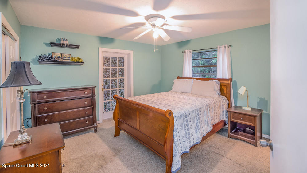 4211 Mustang Road Melbourne, FL 32934 - Photo 41 of 61 025_bedroom_iii_view_i