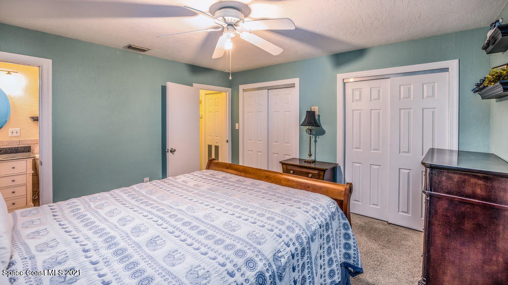 4211 Mustang Road Melbourne, FL 32934 - Photo 42 of 61 026_bedroom_iii_view_ii