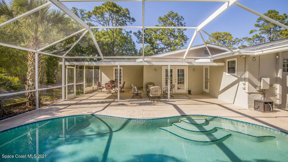 4211 Mustang Road Melbourne, FL 32934 - Photo 46 of 61 059_pool_view_ii