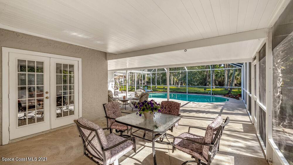 4211 Mustang Road Melbourne, FL 32934 - Photo 48 of 61 018_back_patio_view_vi