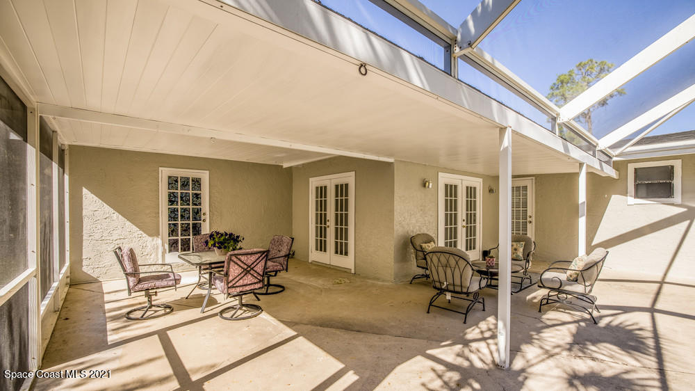 4211 Mustang Road Melbourne, FL 32934 - Photo 49 of 61 015_back_patio_view_iii