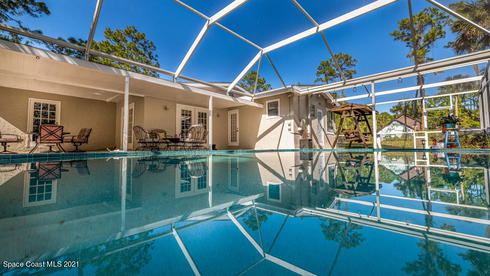 4211 Mustang Road Melbourne, FL 32934 - Photo 50 of 61 061_pool_view_iv