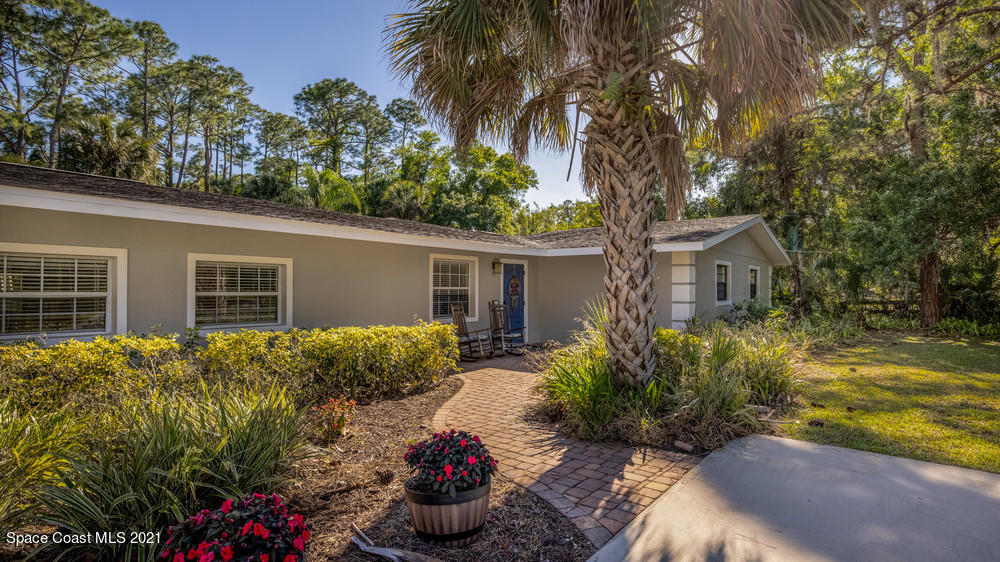4211 Mustang Road Melbourne, FL 32934 - Photo 6 of 61 005_front_of_home