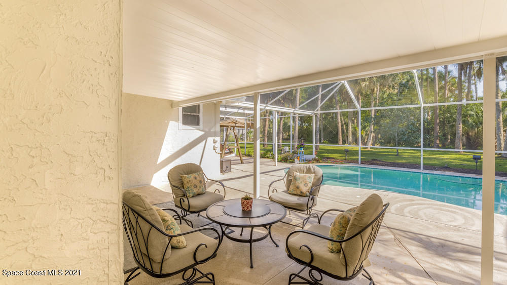4211 Mustang Road Melbourne, FL 32934 - Photo 51 of 61 016_back_patio_view_iv