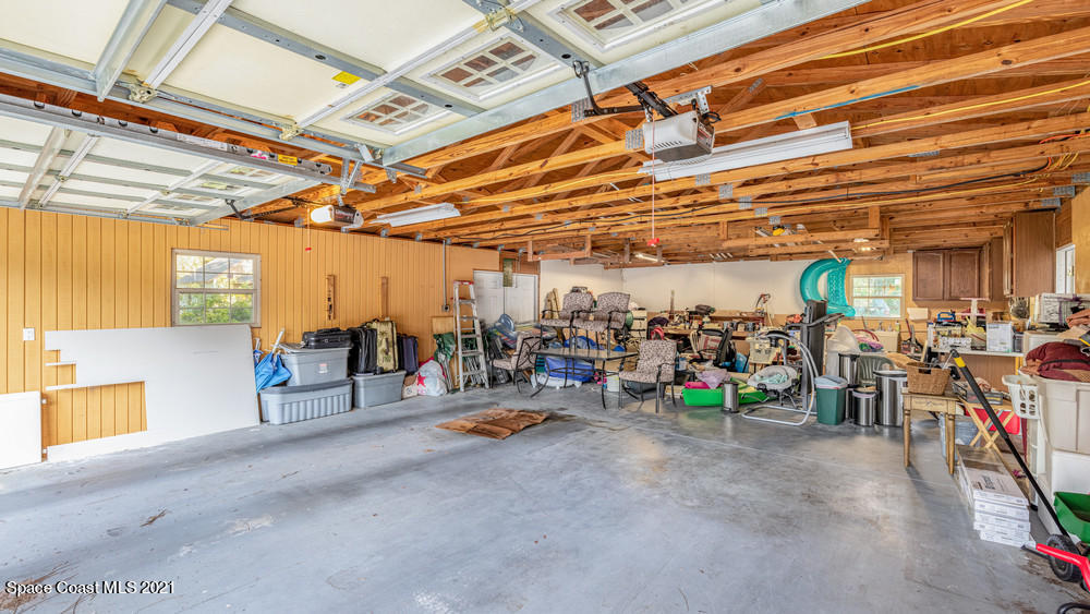 4211 Mustang Road Melbourne, FL 32934 - Photo 54 of 61 037_garage_view