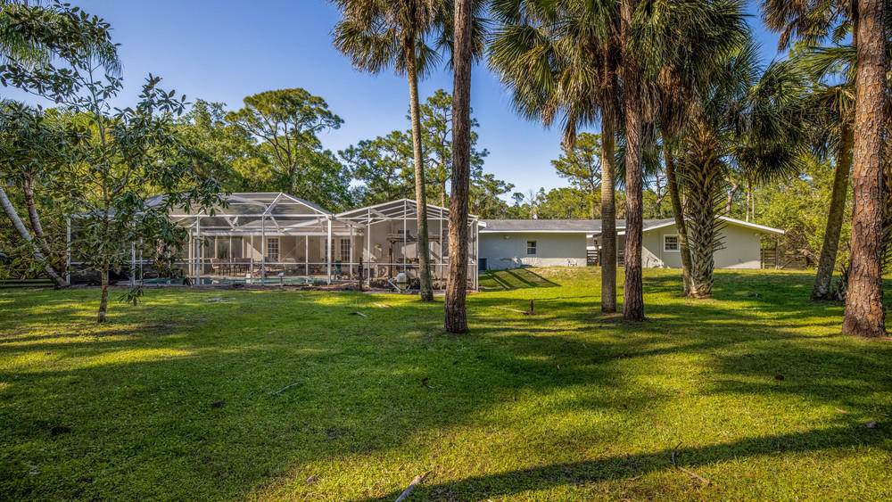 4211 Mustang Road Melbourne, FL 32934 - Photo 55 of 61 012_back_of_home_view_iii