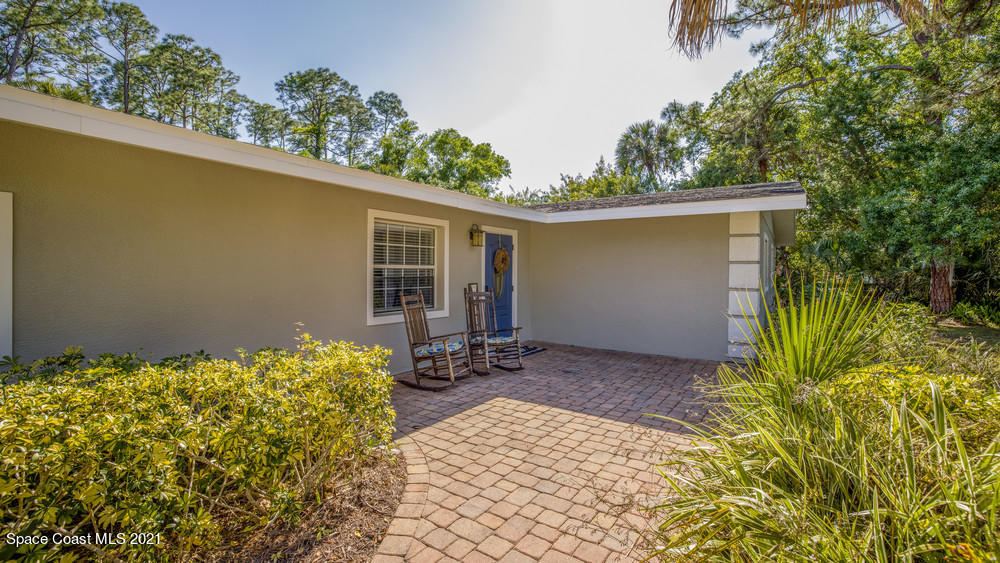 4211 Mustang Road Melbourne, FL 32934 - Photo 7 of 61 006_front_porch_view