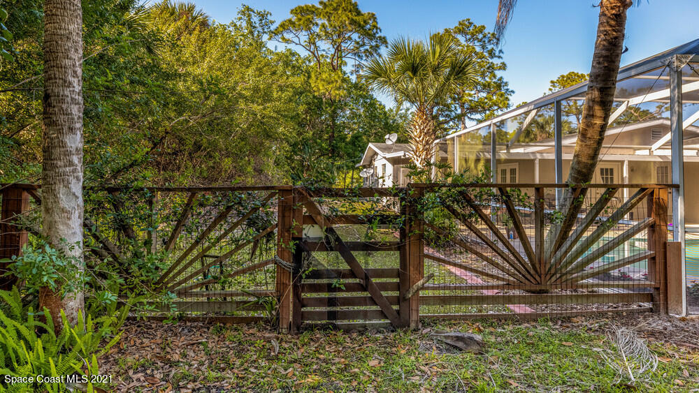 4211 Mustang Road Melbourne, FL 32934 - Photo 61 of 61 011_back_gate