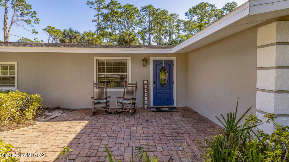 4211 Mustang Road Melbourne, FL 32934 - Photo 8 of 61 034_front_door_view_i