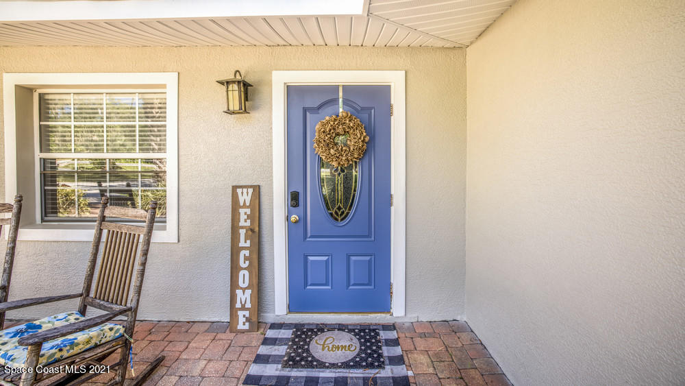 4211 Mustang Road Melbourne, FL 32934 - Photo 10 of 61 035_front_door_view_ii