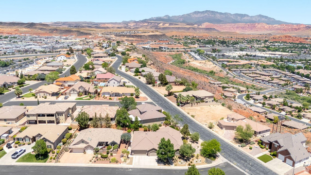 1609 East 10 S Street St. George, UT 84790 - Photo 65 of 68 Residential neighborhood with varied architectural styles, mature landscaping, and paved streets