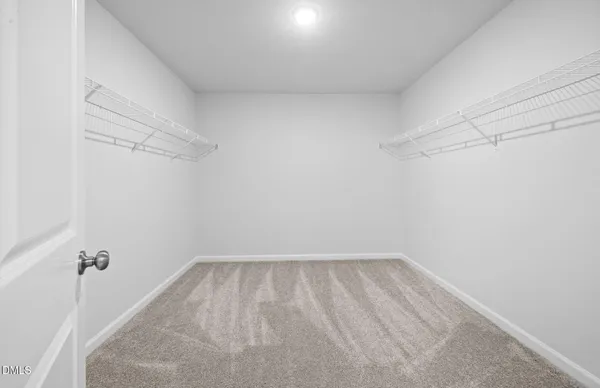 a view of a room with racks on the wall