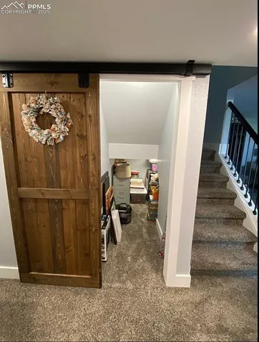 a view of a porch with furniture