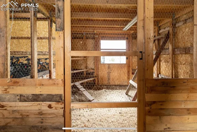 a view of a porch with a floor to ceiling windows