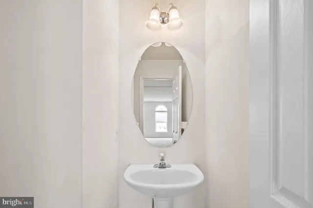 a view of staircase with white walls