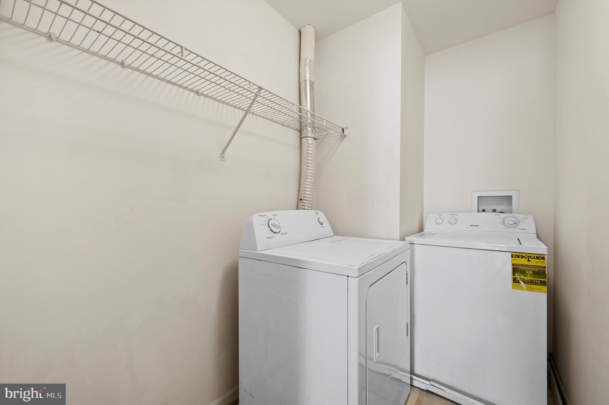 7122 Silverleaf Oak Road, Unit 227 Elkridge, MD 21075 - Photo 34 of 55 a utility room with dryer and washer