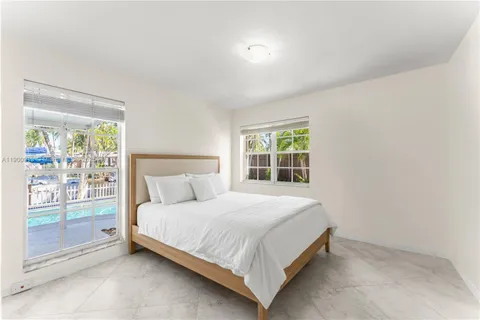 a view of a livingroom with furniture window and outside view