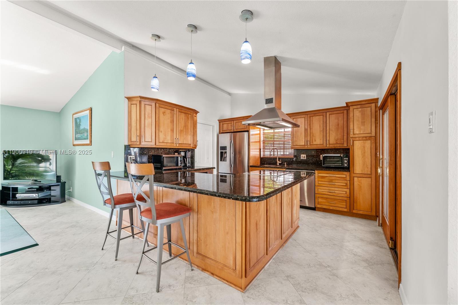 1625 Southwest 5th Court Fort Lauderdale, FL 33312 - Photo 8 of 22 a view of a kitchen with kitchen island granite countertop lots of counter top space