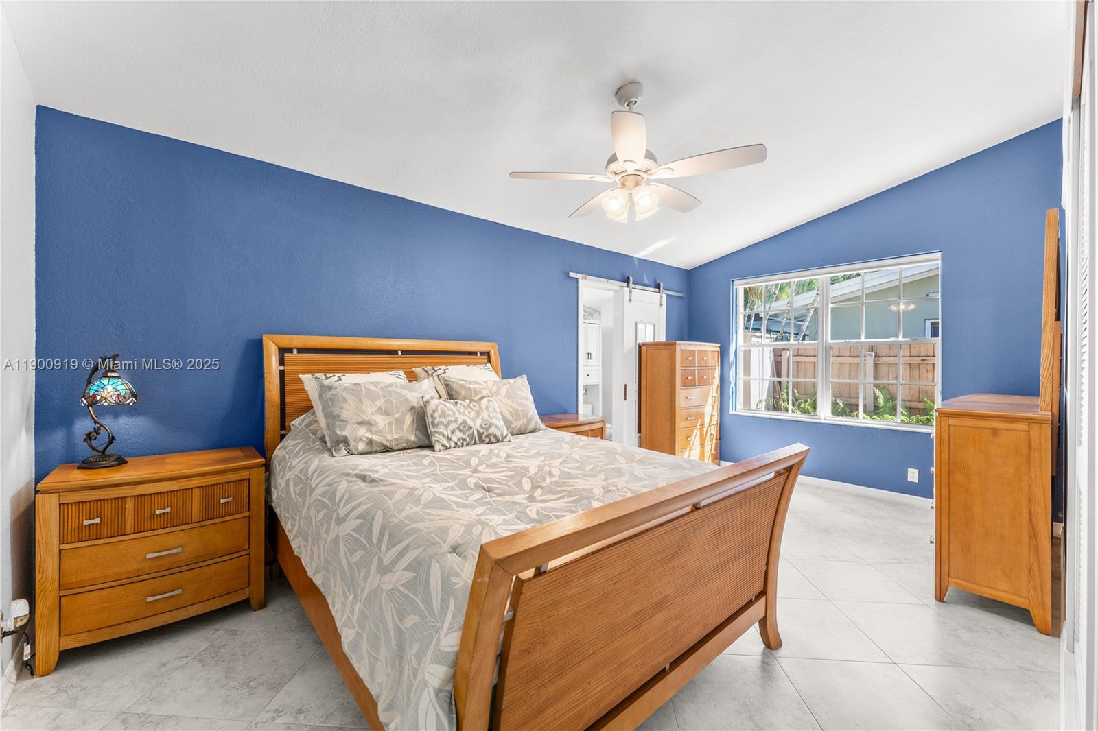 1625 Southwest 5th Court Fort Lauderdale, FL 33312 - Photo 10 of 22 a bedroom with a bed and a dresser