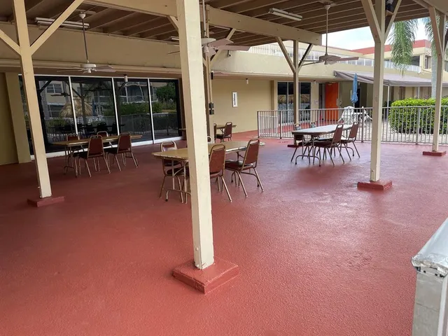 a view of a porch with a bench in balcony