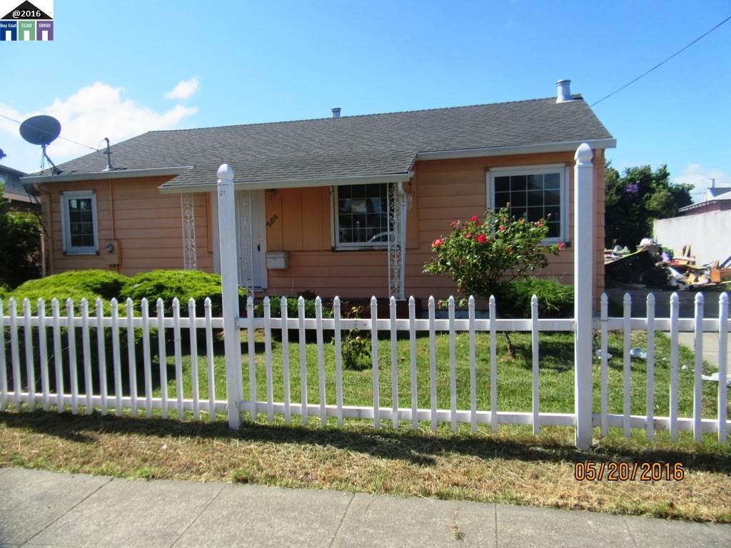 254 Fitzpatrick Road Oakland, CA 94603 - Photo 1 of 1 a front view of a house with a garden and plants
