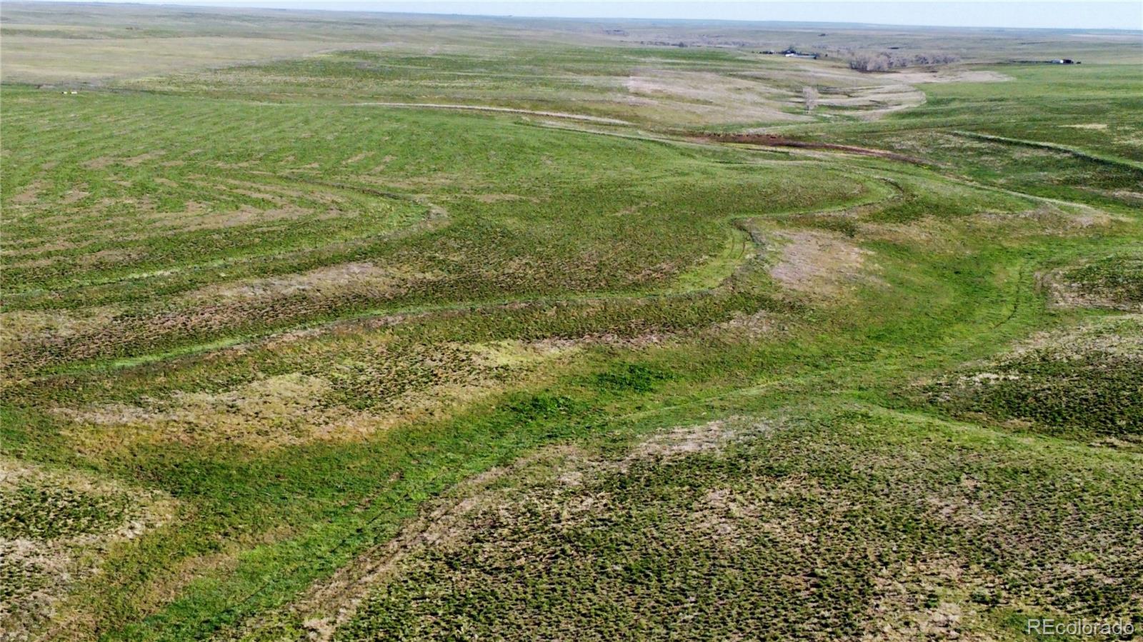 125 County Road Deer Trail, CO 80105 - Photo 16 of 29 a view of an ocean and beach