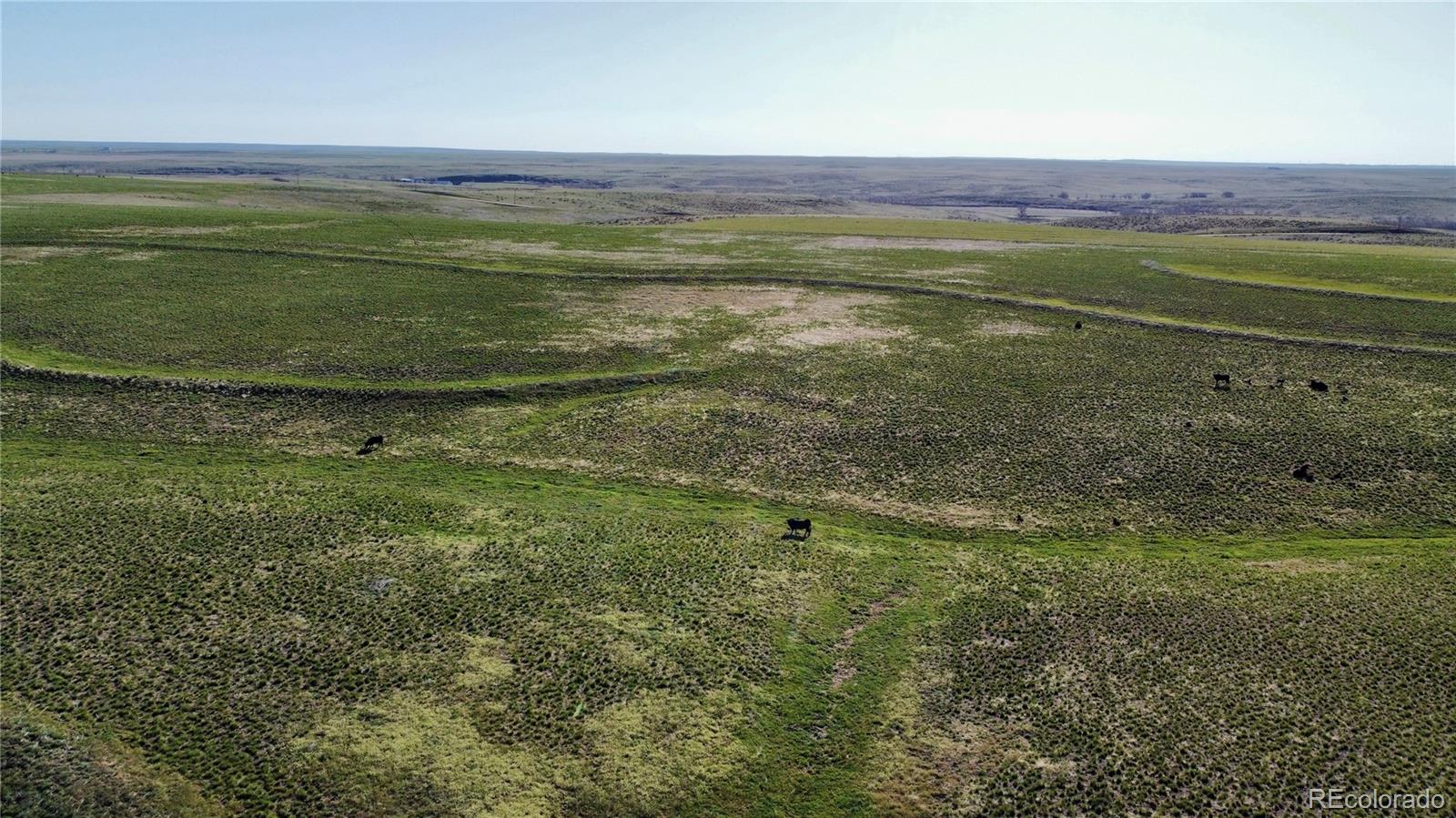 125 County Road Deer Trail, CO 80105 - Photo 17 of 29 a view of an outdoor space with a lake view