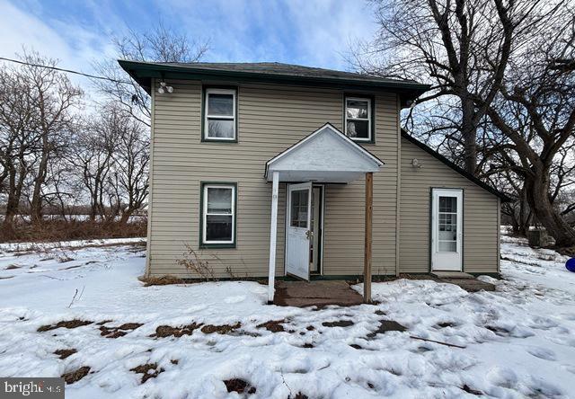 137 Repaupo Station Road Swedesboro, NJ 08085 - Photo 14 of 17 a front view of a house with a yard