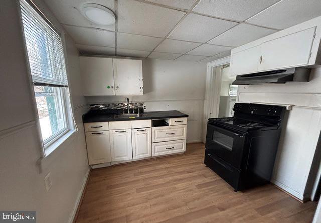 137 Repaupo Station Road Swedesboro, NJ 08085 - Photo 16 of 17 a kitchen with granite countertop a sink cabinets and stainless steel appliances
