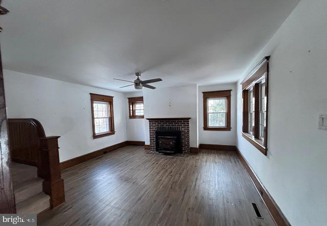 137 Repaupo Station Road Swedesboro, NJ 08085 - Photo 2 of 17 a view of livingroom with furniture fireplace and wooden floor