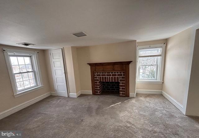 137 Repaupo Station Road Swedesboro, NJ 08085 - Photo 3 of 17 an empty room with windows and fireplace