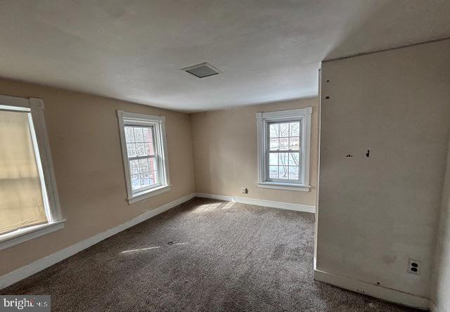 137 Repaupo Station Road Swedesboro, NJ 08085 - Photo 6 of 17 a view of an empty room with a window