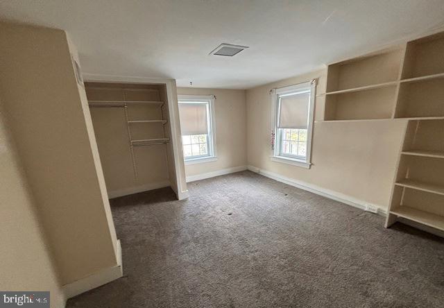 137 Repaupo Station Road Swedesboro, NJ 08085 - Photo 7 of 17 a view of empty room with window and wooden floor
