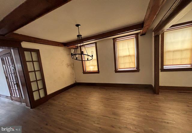 137 Repaupo Station Road Swedesboro, NJ 08085 - Photo 10 of 17 a view of a room with wooden floor and windows
