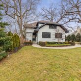 a front view of house with yard