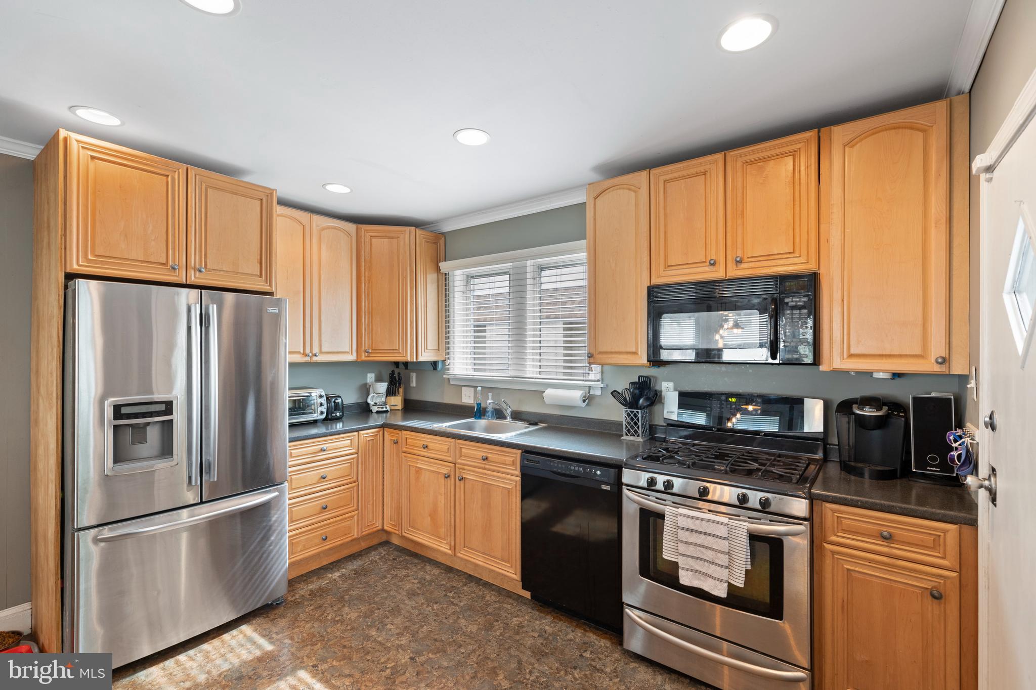 312 South State Road Upper Darby, PA 19082 - Photo 1 of 37 a kitchen with stainless steel appliances granite countertop a refrigerator stove top oven and sink