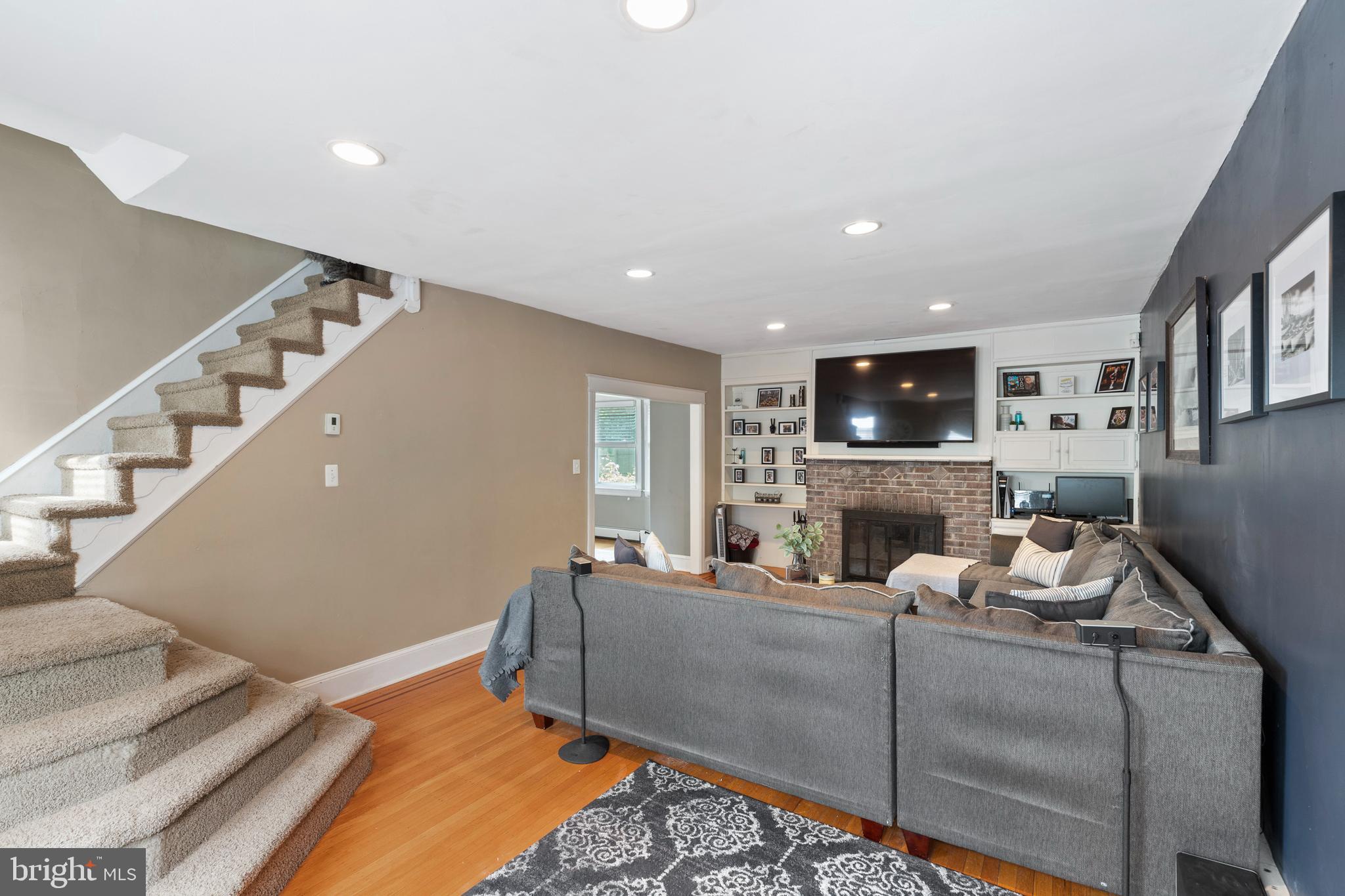 312 South State Road Upper Darby, PA 19082 - Photo 12 of 37 a living room with furniture and a flat screen tv