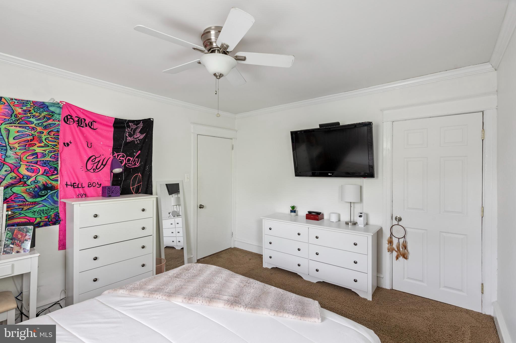 312 South State Road Upper Darby, PA 19082 - Photo 19 of 37 a bedroom with a bed and a flat screen tv in the dresser