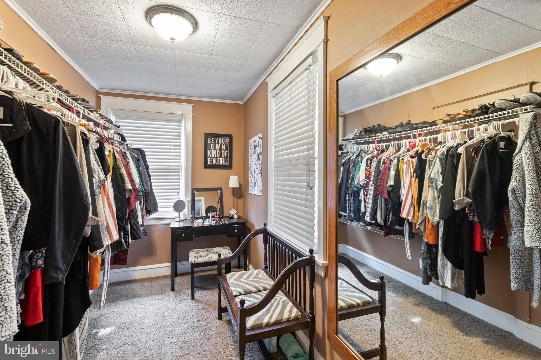 312 South State Road Upper Darby, PA 19082 - Photo 22 of 37 a view of walk in closet with clothes and shoes