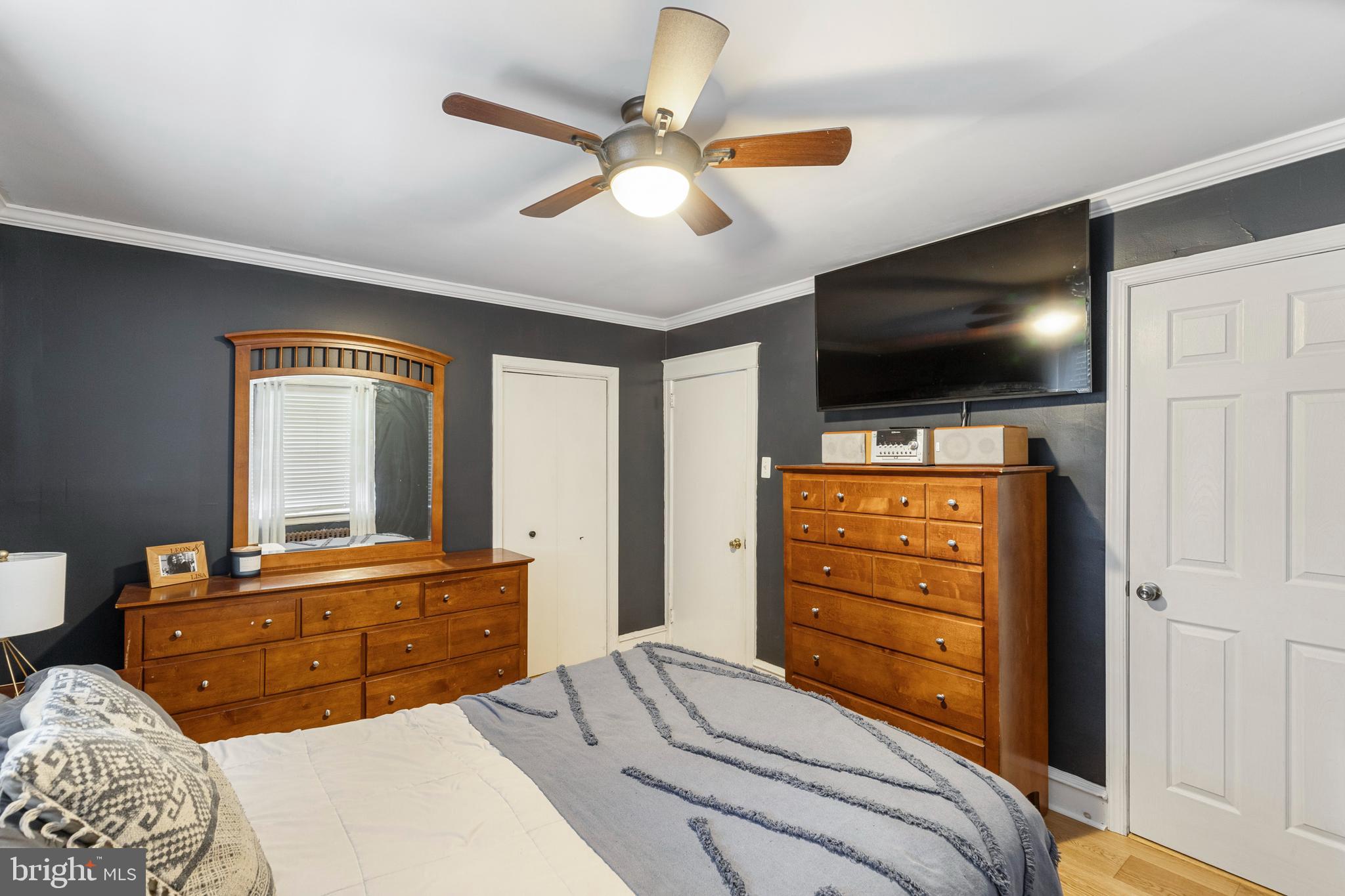 312 South State Road Upper Darby, PA 19082 - Photo 25 of 37 a bedroom with a bed and a flat screen tv