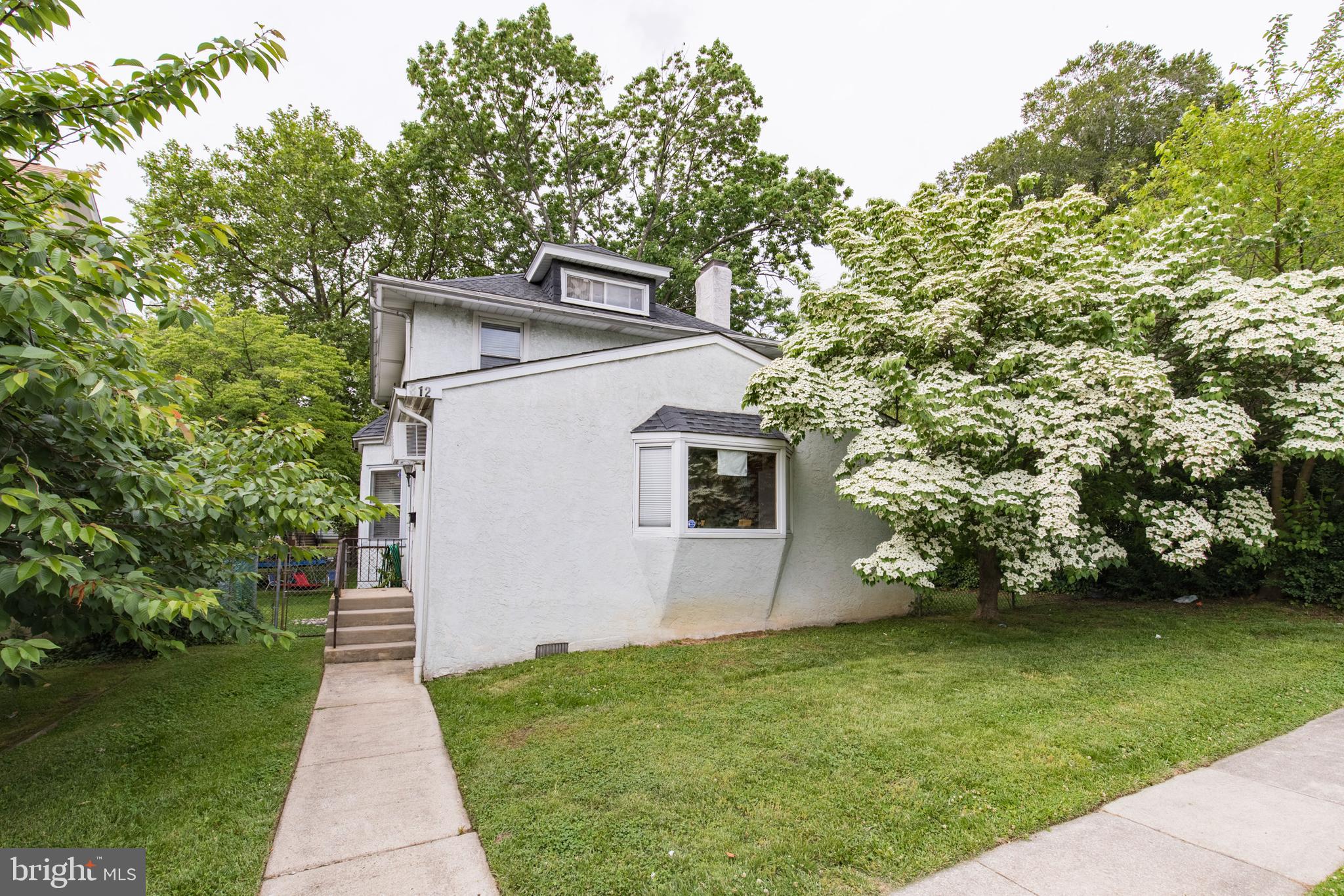 312 South State Road Upper Darby, PA 19082 - Photo 27 of 37 a backyard of a house with lots of green space