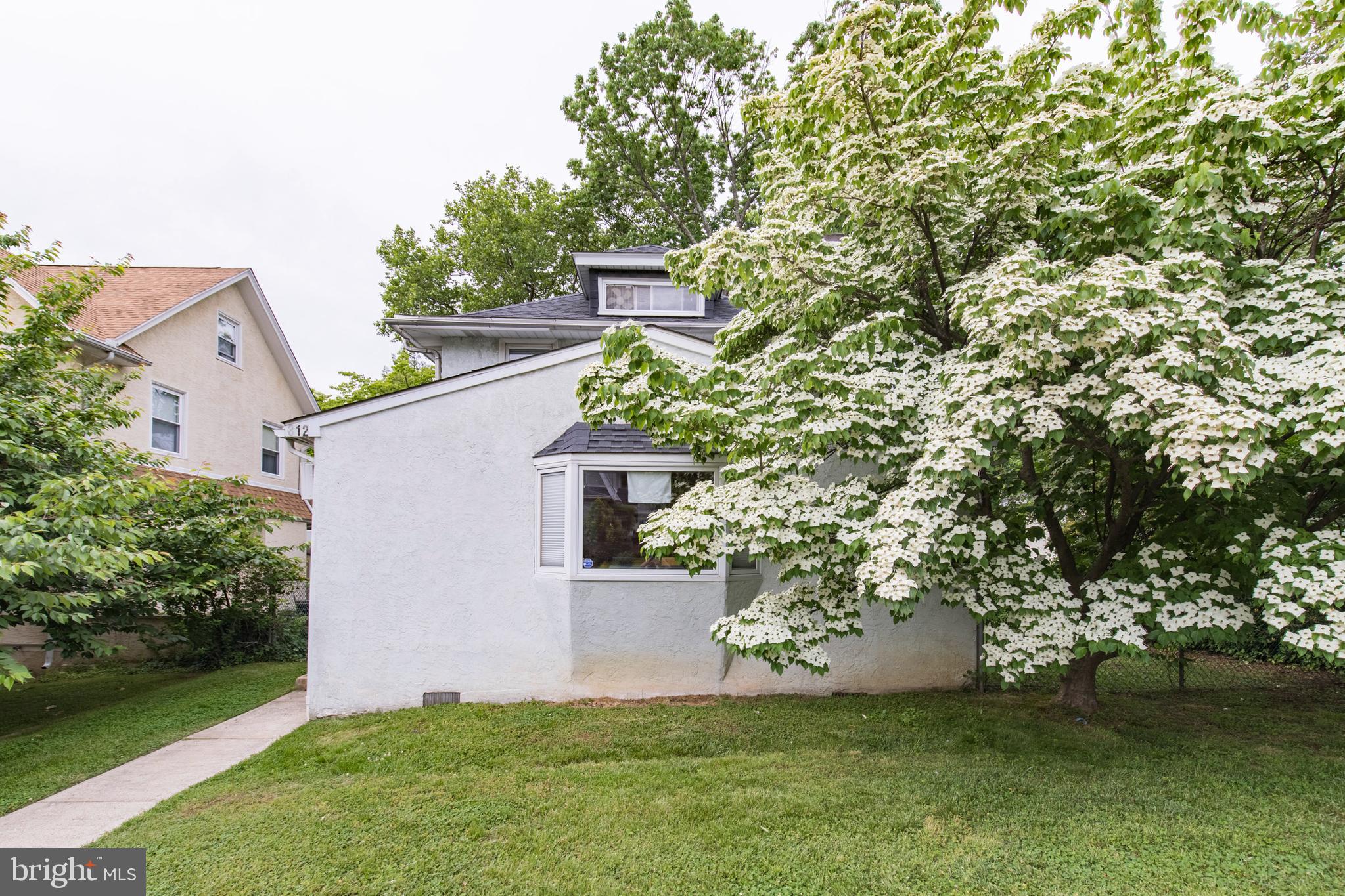 312 South State Road Upper Darby, PA 19082 - Photo 28 of 37 front view of a house with a yard
